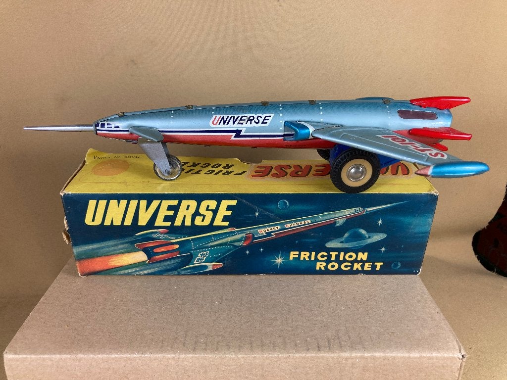Blikken Universe Frictian Rocket met originele doos, Antiek en Kunst, Antiek | Speelgoed, Ophalen of Verzenden
