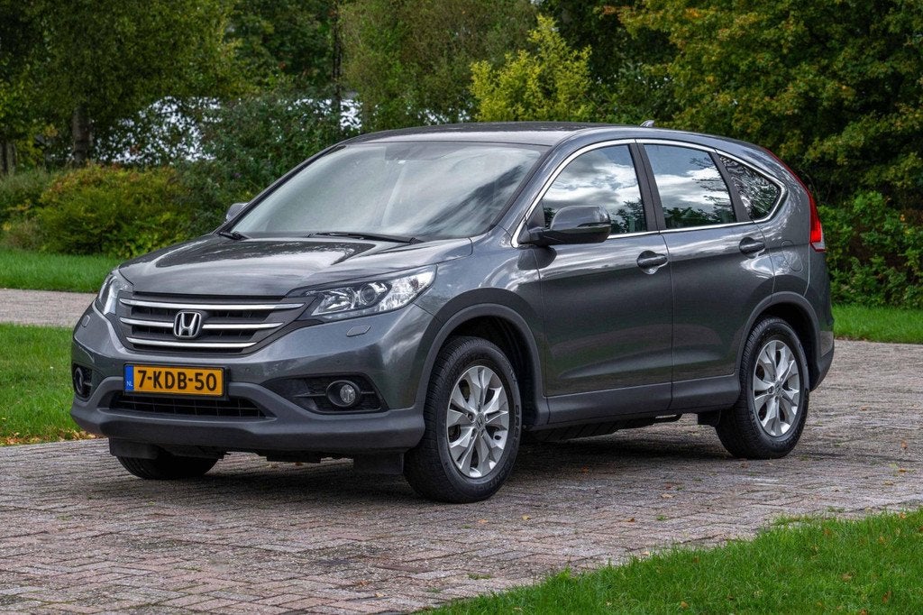 Honda CR-V 2.0 AWD Elegance 4WD 74.600 km +NAP NL-auto, Auto's, Honda, Keurmerk '100% Onderhouden', Euro 5, Gebruikt, 4 cilinders