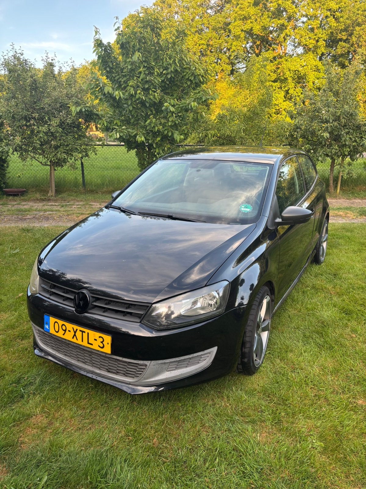 Volkswagen Polo 1.2 2010 Zwart, Auto's, Voorwielaandrijving, Euro 5, 967 kg, 40 €/maand