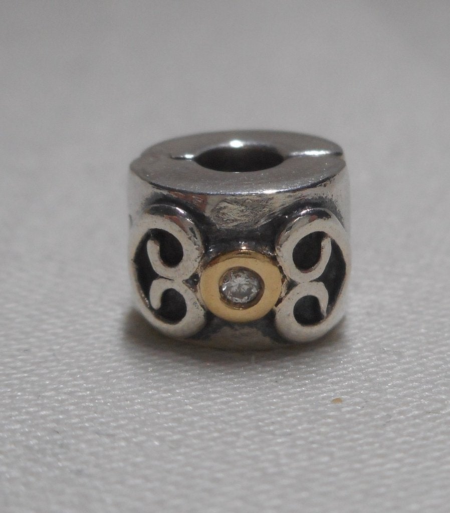 Zilveren Pandora Clip bedel met 14 kt goud en diamant nr.659