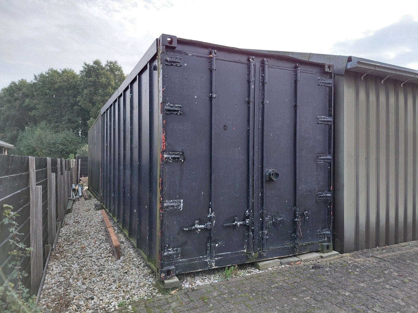 Zwarte 20ft zeecontainer 6M met werkplaats en magazijn, Ophalen