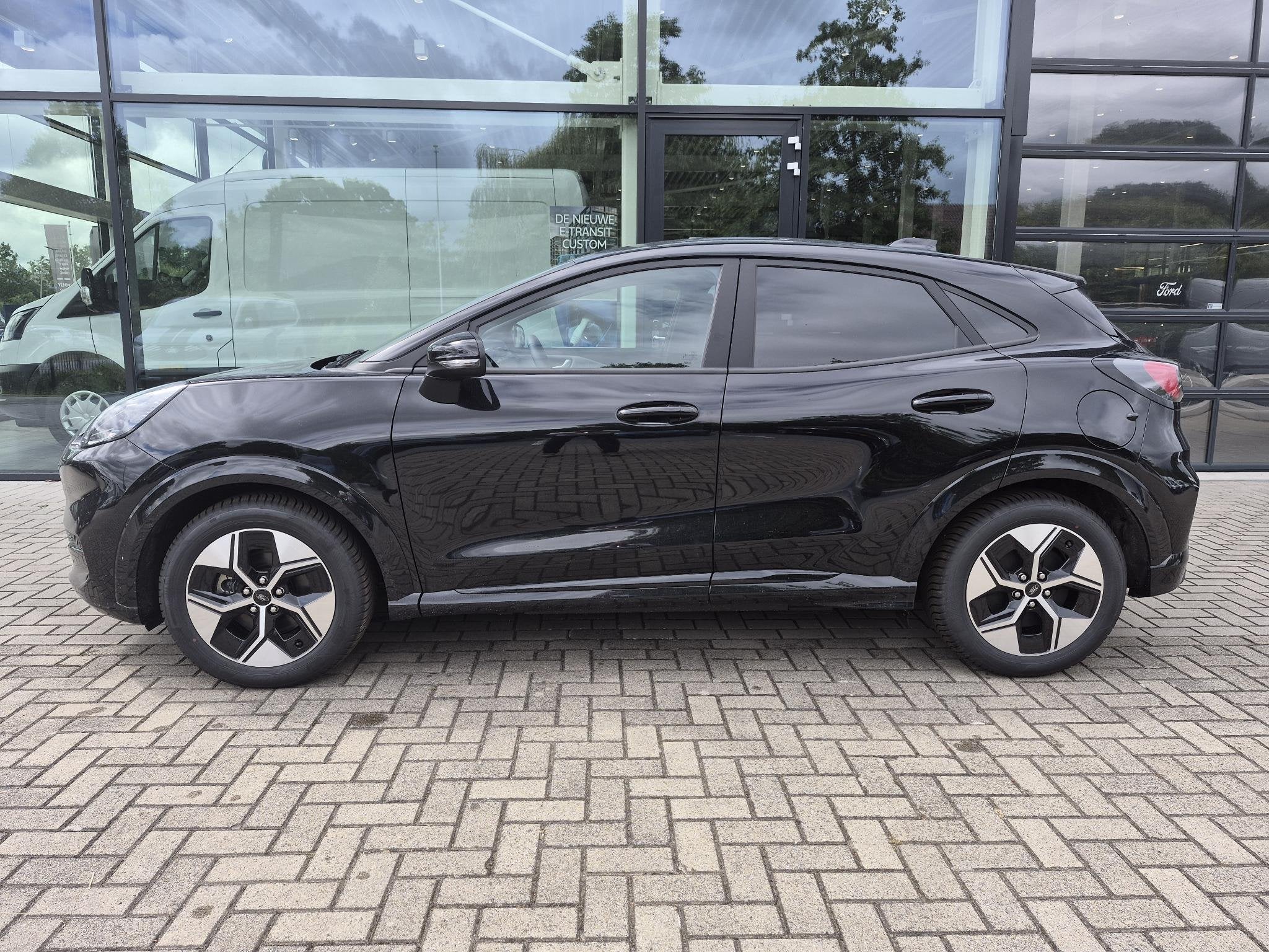Ford Puma Gen-E Select 47 kWh, Auto's, Puma, Zwart, Te koop, BTW verrekenbaar