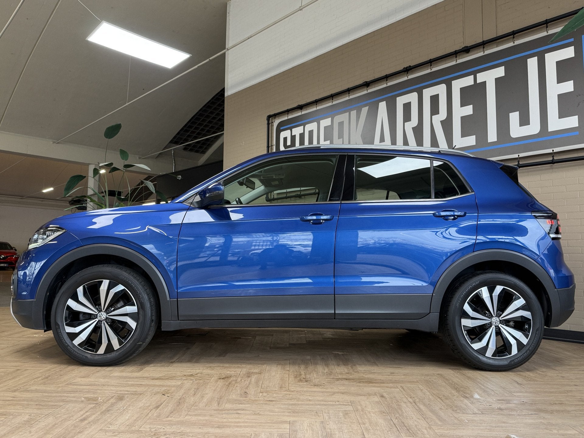 Volkswagen T-Cross 1.0 TSI 115pk DSG Style | Navi | Carplay, Auto's, Dealer onderhouden, Gebruikt, Zwart, Blauw