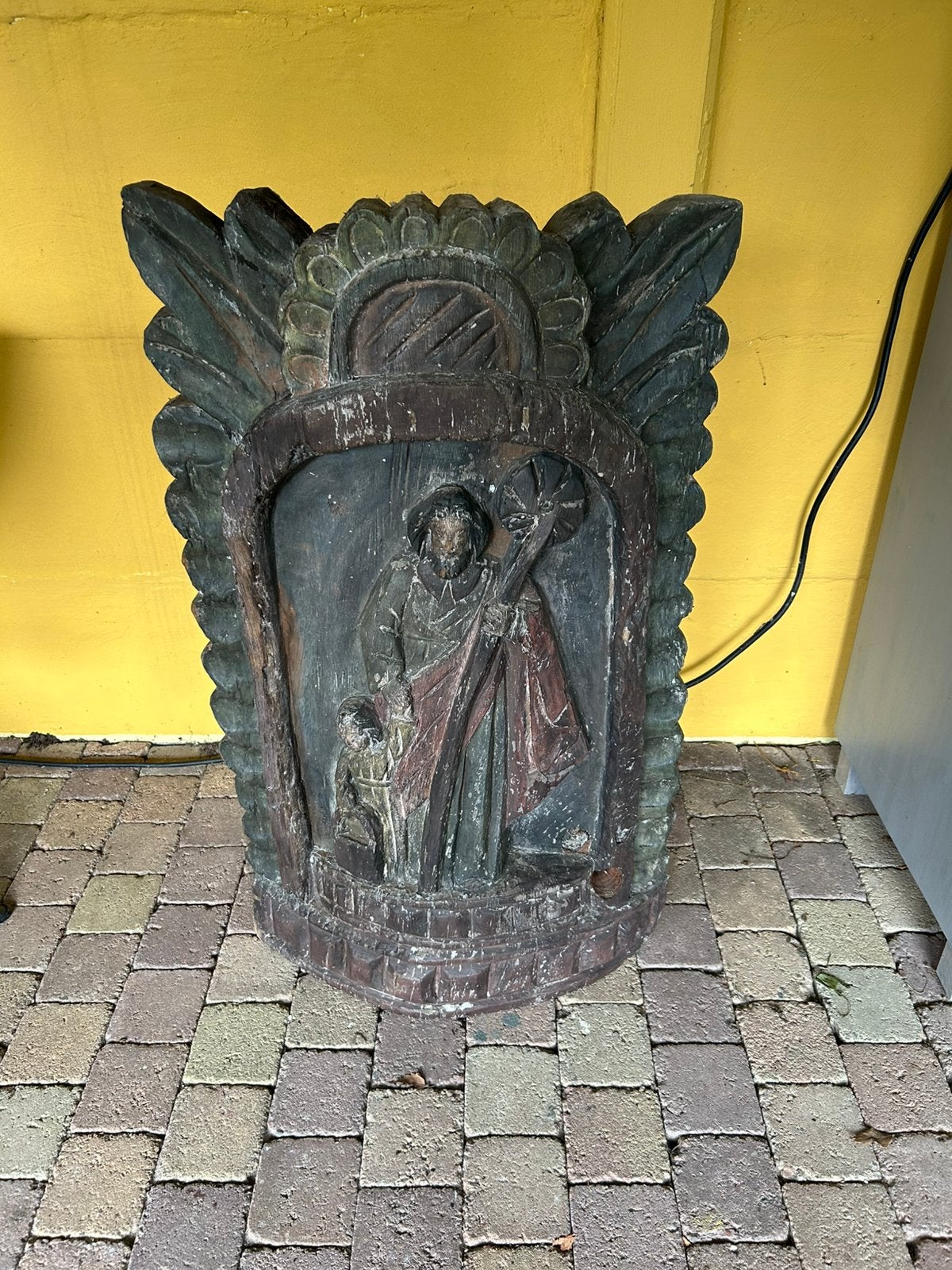 Houten reliëf, Ophalen