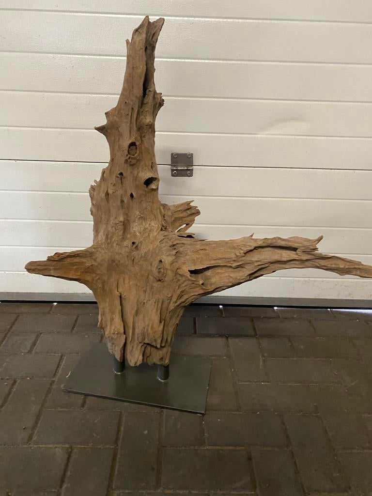 Kunst boomstam, Ophalen