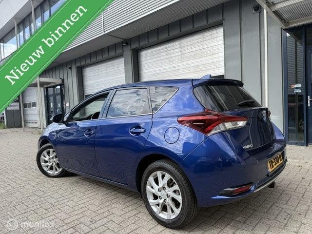 Toyota Auris 1.8 Hybrid Energy Plus, Auto's, Gebruikt, Euro 6, 4 cilinders, Blauw