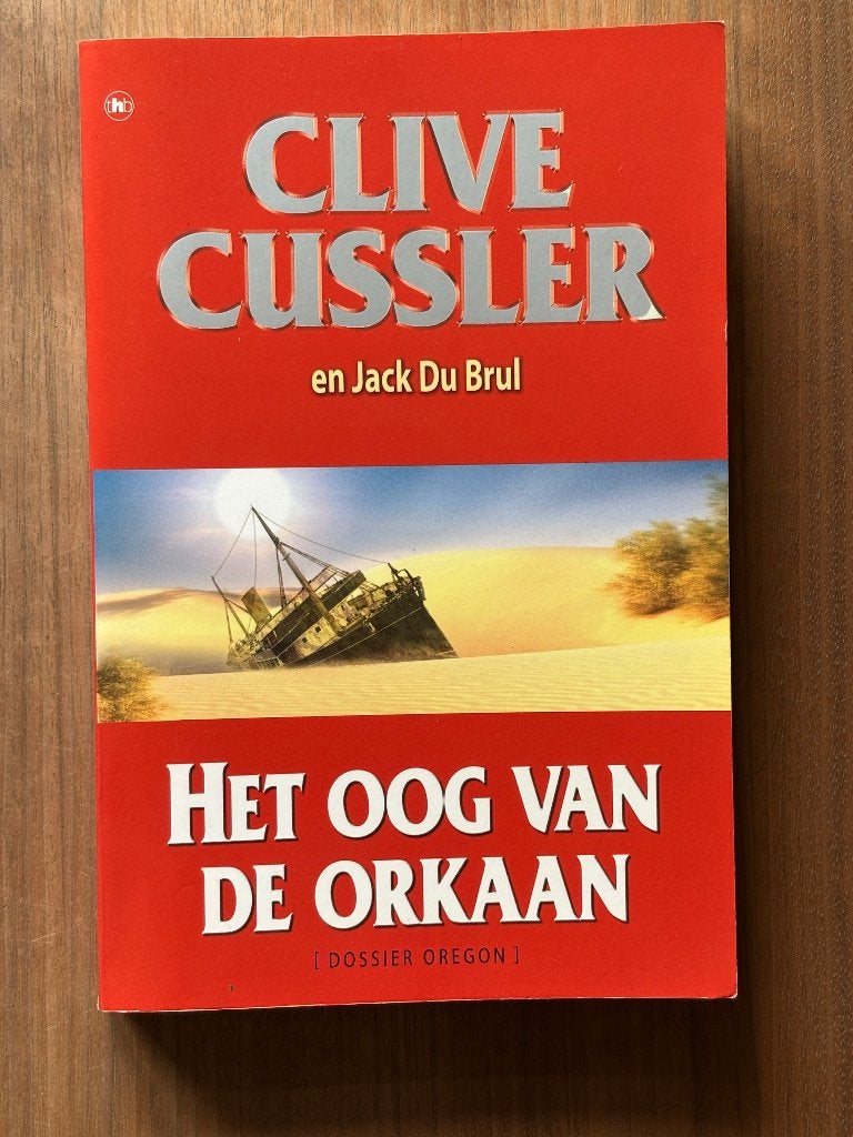 Boek: Het oog van de orkaan - Clive Cussler, Jack Du Brul, Ophalen of Verzenden, Gelezen