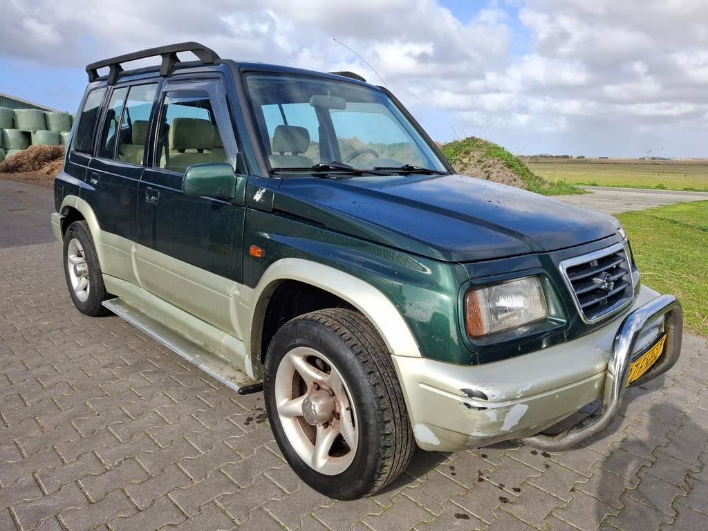 Suzuki Vitara 2.0 Villager V6 AUT 4WD 1997 Groen, Auto's, 1998 cc, 136 pk, Origineel Nederlands, Vierwielaandrijving
