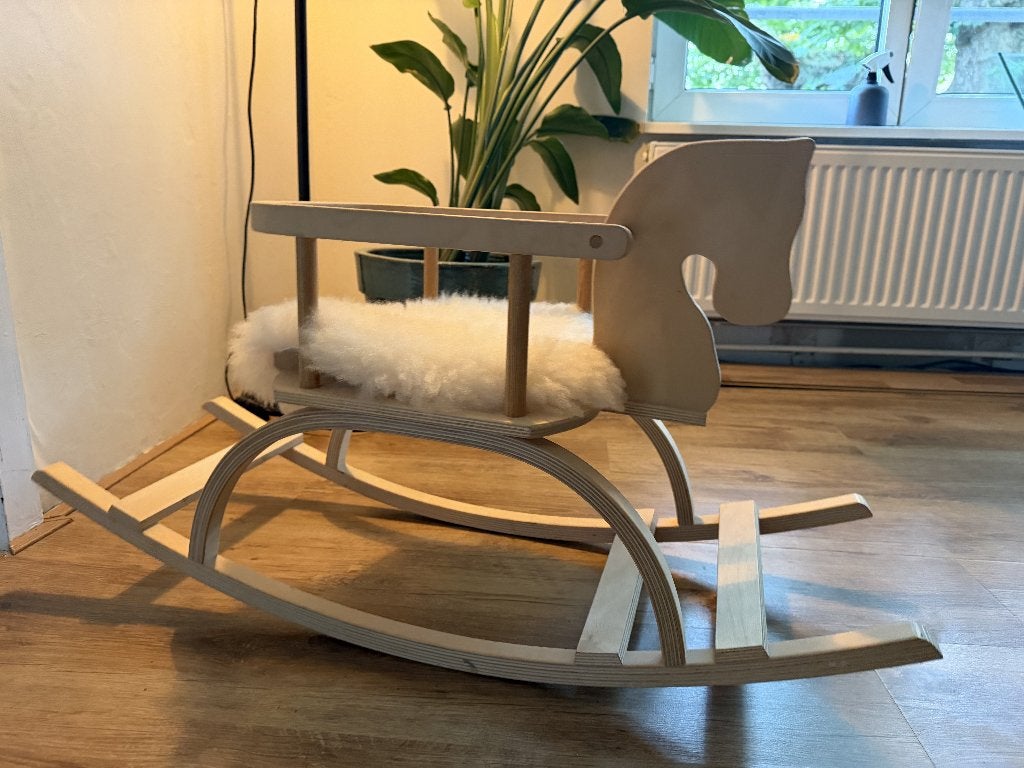 'Petit Puck' hobbelpaard met Schapenvacht, handgemaakt, Ophalen, Zo goed als nieuw, Wipstoel, Overige merken