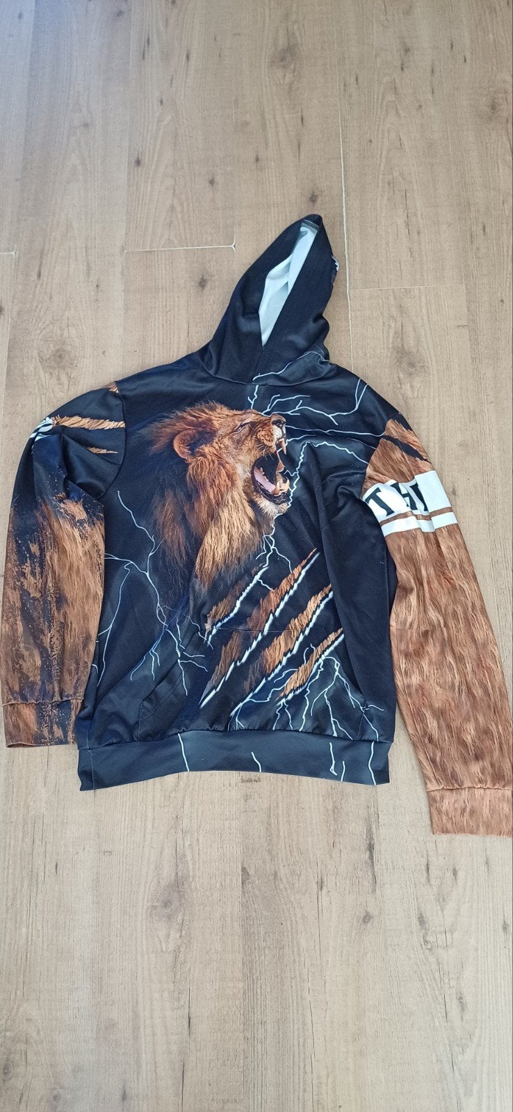 Hoodie met Leeuwenprint en Bliksem - Maat XL, Kleding | Heren, Ophalen of Verzenden, Gedragen, Maat 56/58 (XL), Meerkleurig