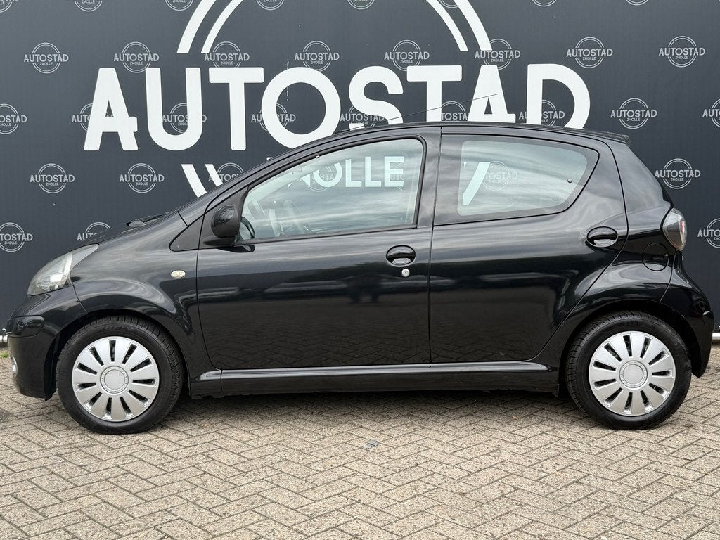 Toyota Aygo 1.0-12V Comfort Automaat / Airco / Navi / APK /, Auto's, Stof, Zwart, Bedrijf, Nieuw