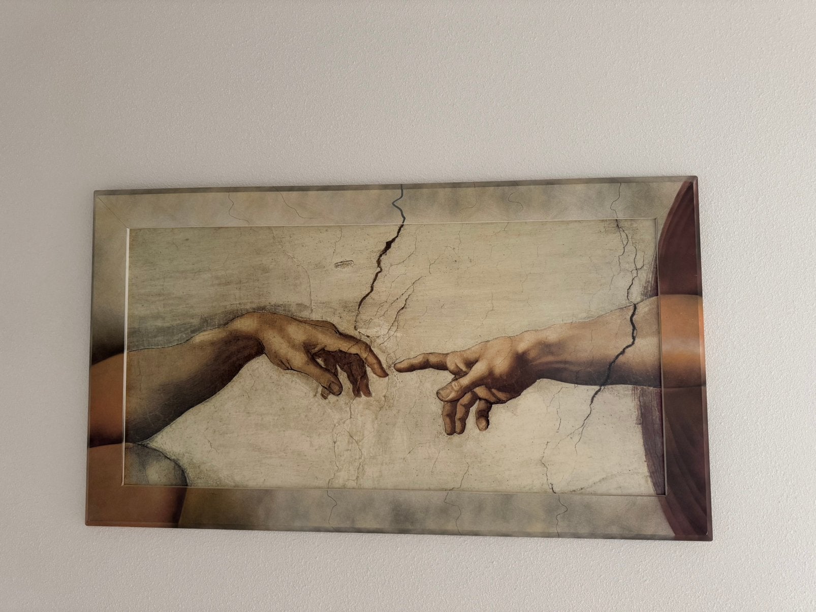 Wanddecoratie "Handen van God en Adam" van Michelangelo, Ophalen