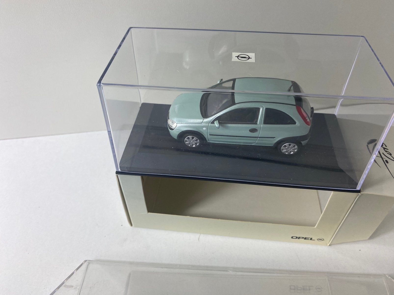 1:43 Opel Corsa-opelnpromo box-in OVP, Ophalen of Verzenden, Nieuw, Auto, Overige merken