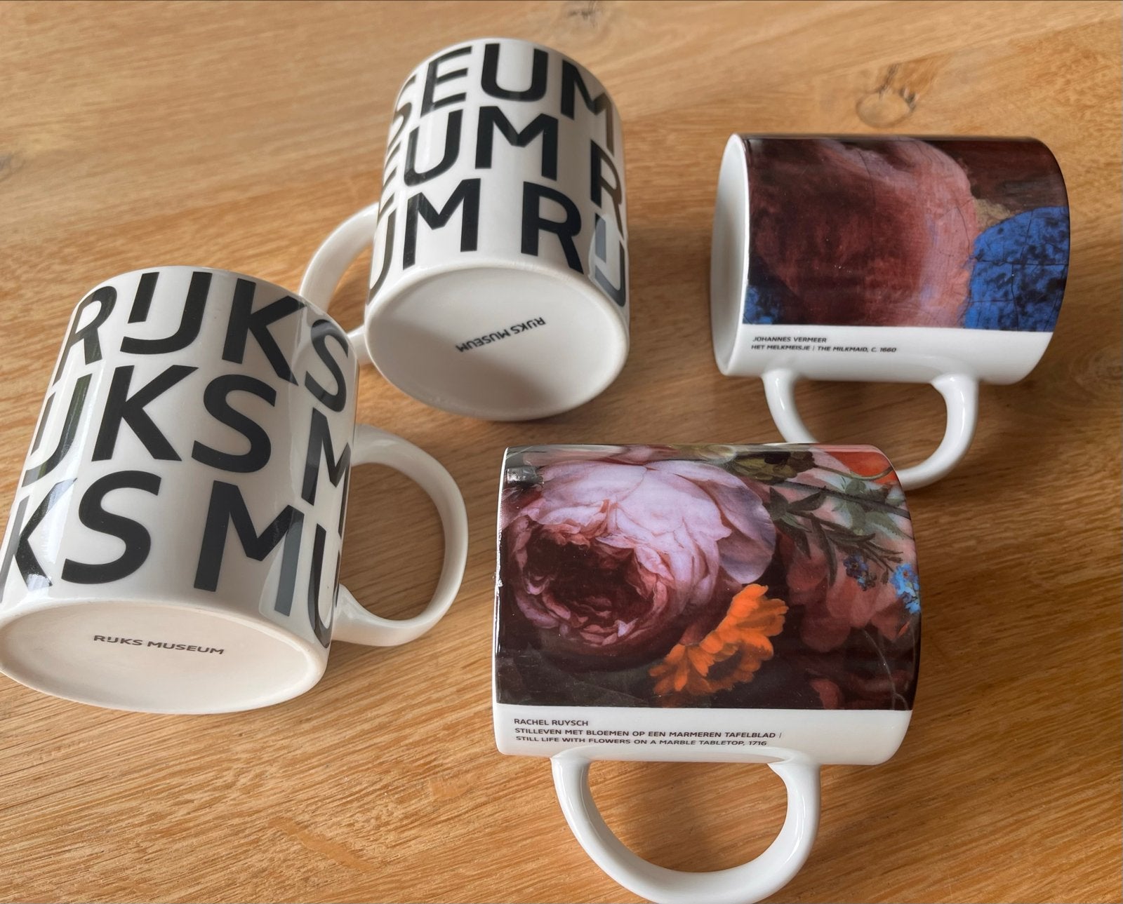 4 Rijksmuseum mokken met kunstwerken en logo, Overige typen, Ophalen of Verzenden, Zo goed als nieuw, Steen/keramiek