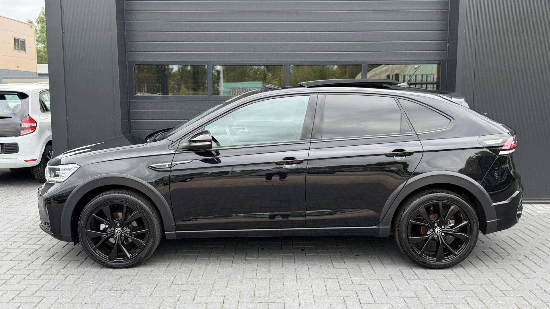 Volkswagen Taigo 1.0 TSI R-Line Panoramdak|Stoelverwarming|C, Auto's, Automaat, Gebruikt, Zwart, Origineel Nederlands