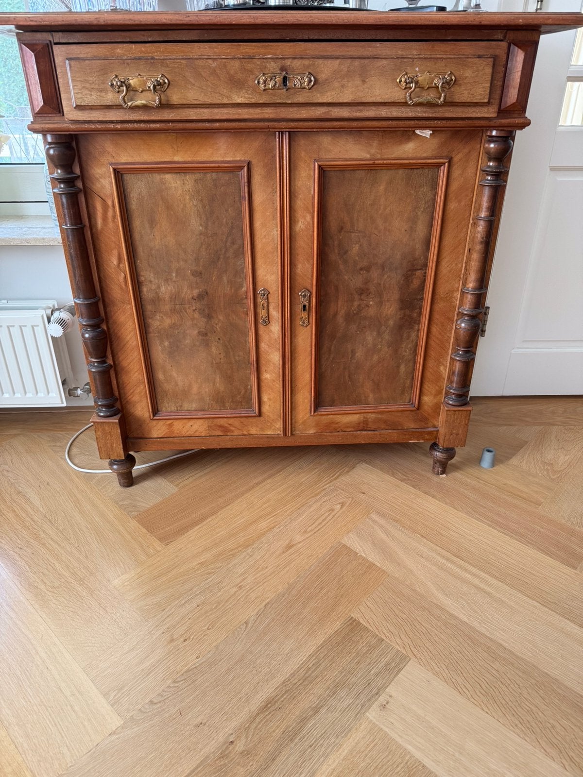 Antiek mahonie kastje, Ophalen