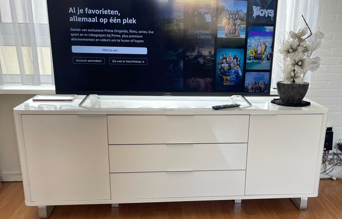 Witte TV-meubel/dressoir met lades en deuren, Ophalen, Kunststof, Gebruikt, 100 tot 150 cm