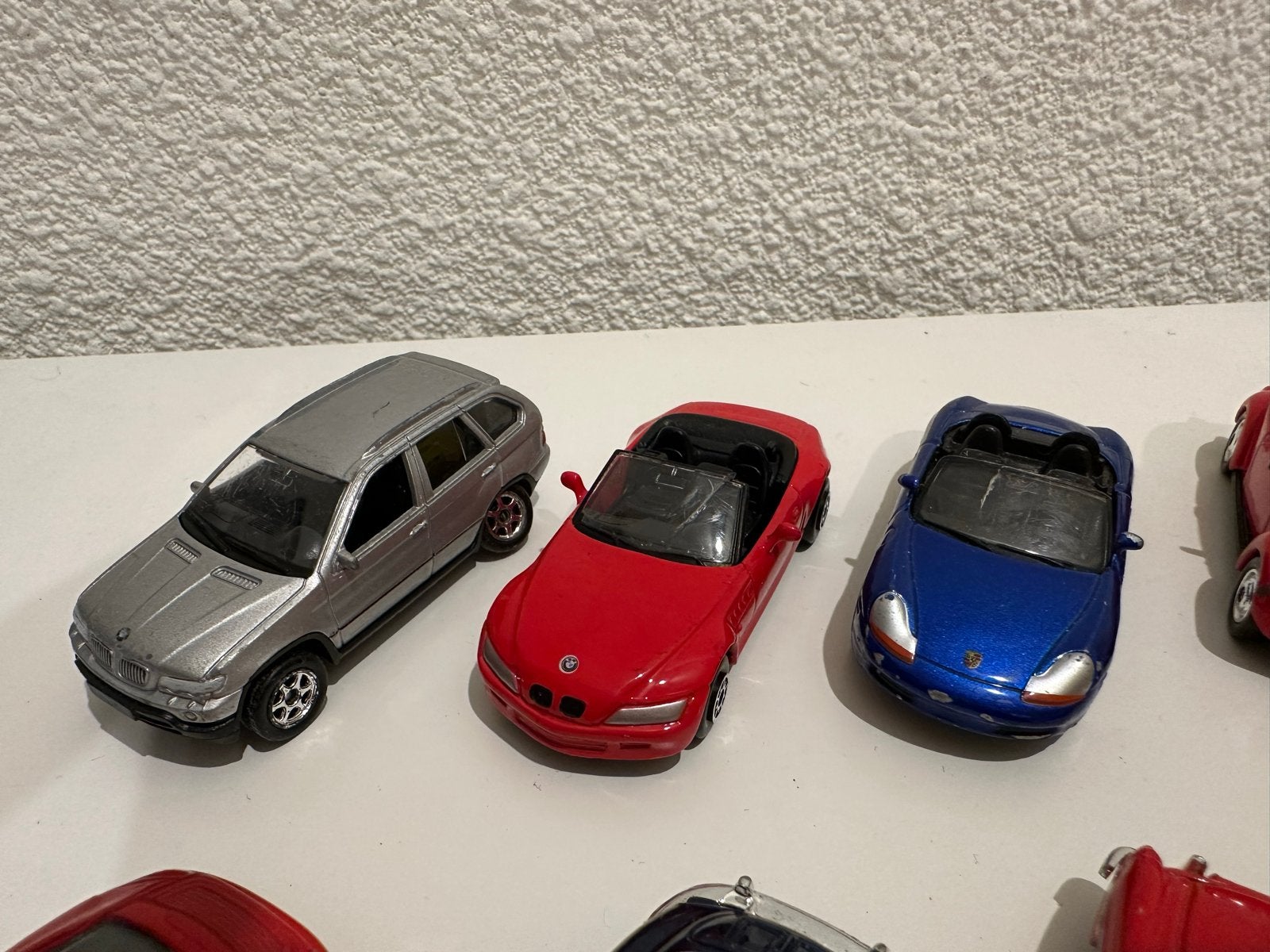 12 Welly modelauto's schaal circa 1:64, diverse jaren, Ophalen of Verzenden, Gebruikt, Auto