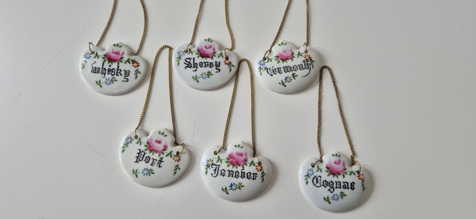 Dranken fles hangers van porselein, Ophalen