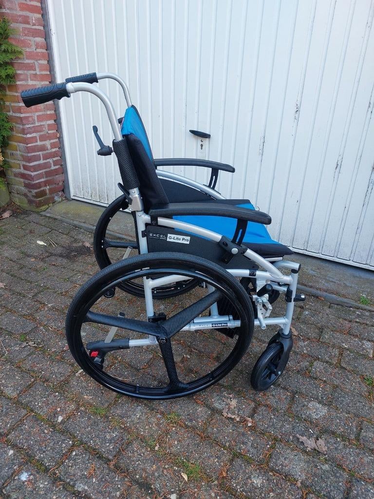 G logic  met hoogte afstelbaar of remmen rolstoel, Diversen, Rolstoelen, Ophalen of Verzenden, Duwrolstoel