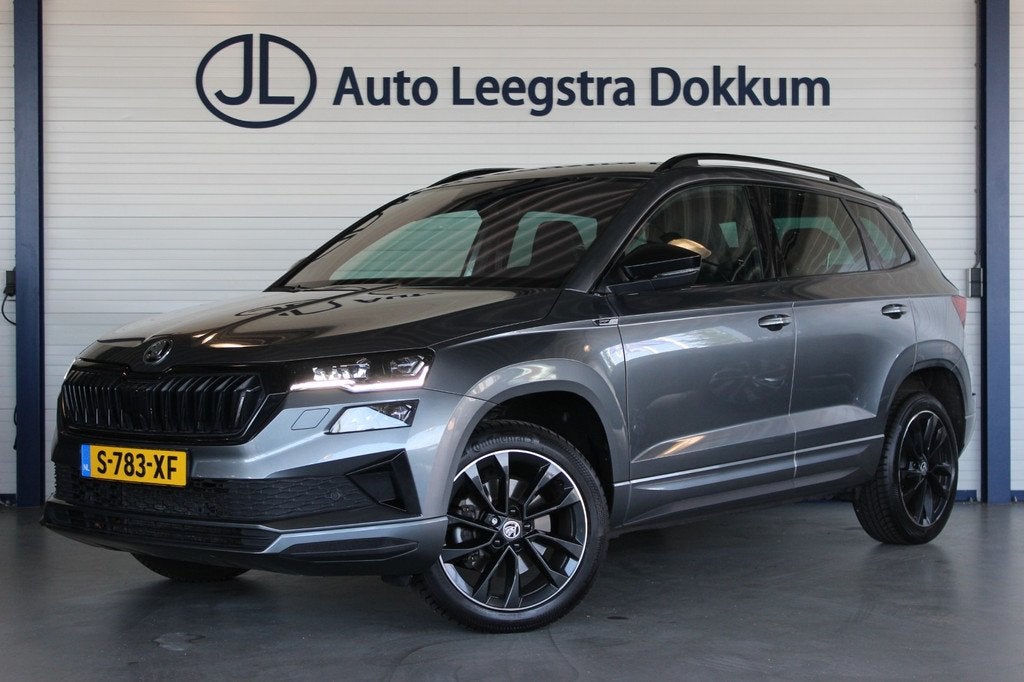 Skoda Karoq 1.5 TSI ACT Sportline Business Facelift | Trekha, Auto's, Skoda, Stof, 4 cilinders, SUV of Terreinwagen, Zilver of Grijs