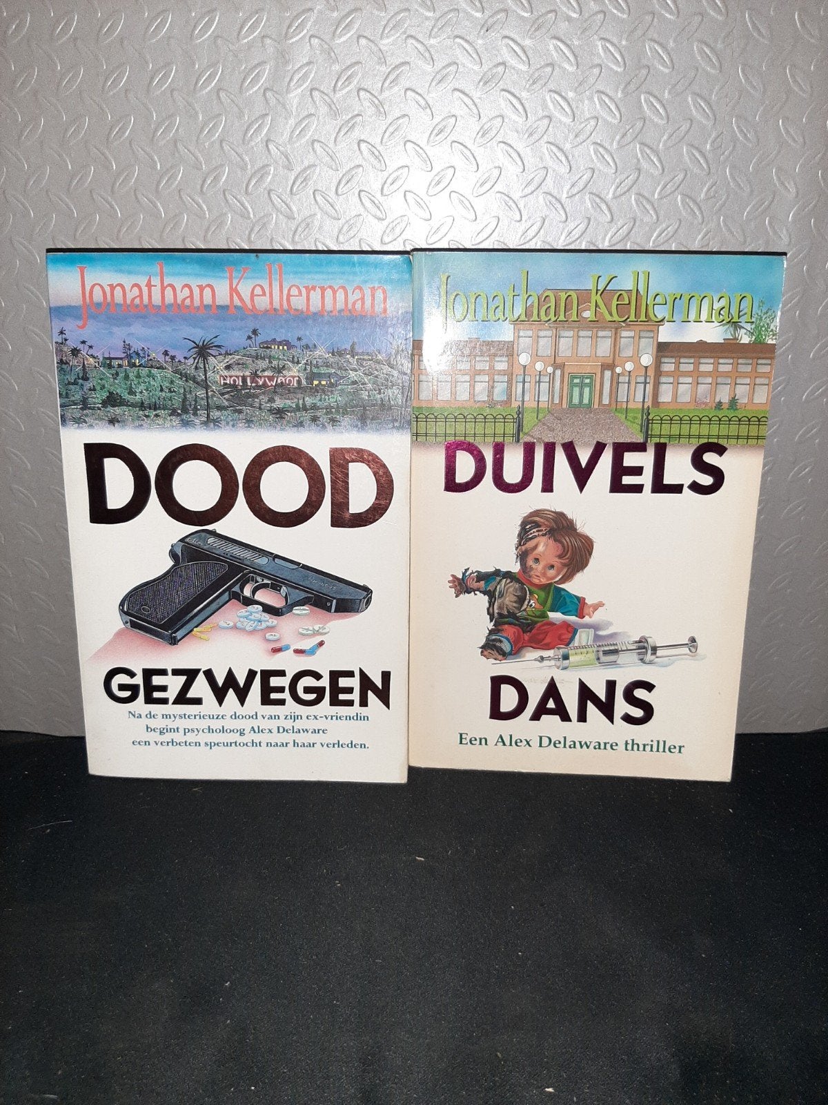Jonathan Kellerman - Doodgezwegen & Duivels Dans (2 boeken), Ophalen of Verzenden, Gelezen, Jonathan Kellerman, Nederland