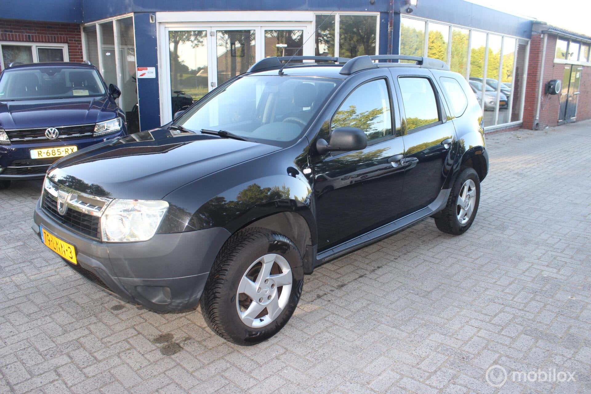 Dacia Duster 1.6 Lauréate 2wd, Auto's, Voorwielaandrijving, Gebruikt, Elektrische ramen, 4 cilinders
