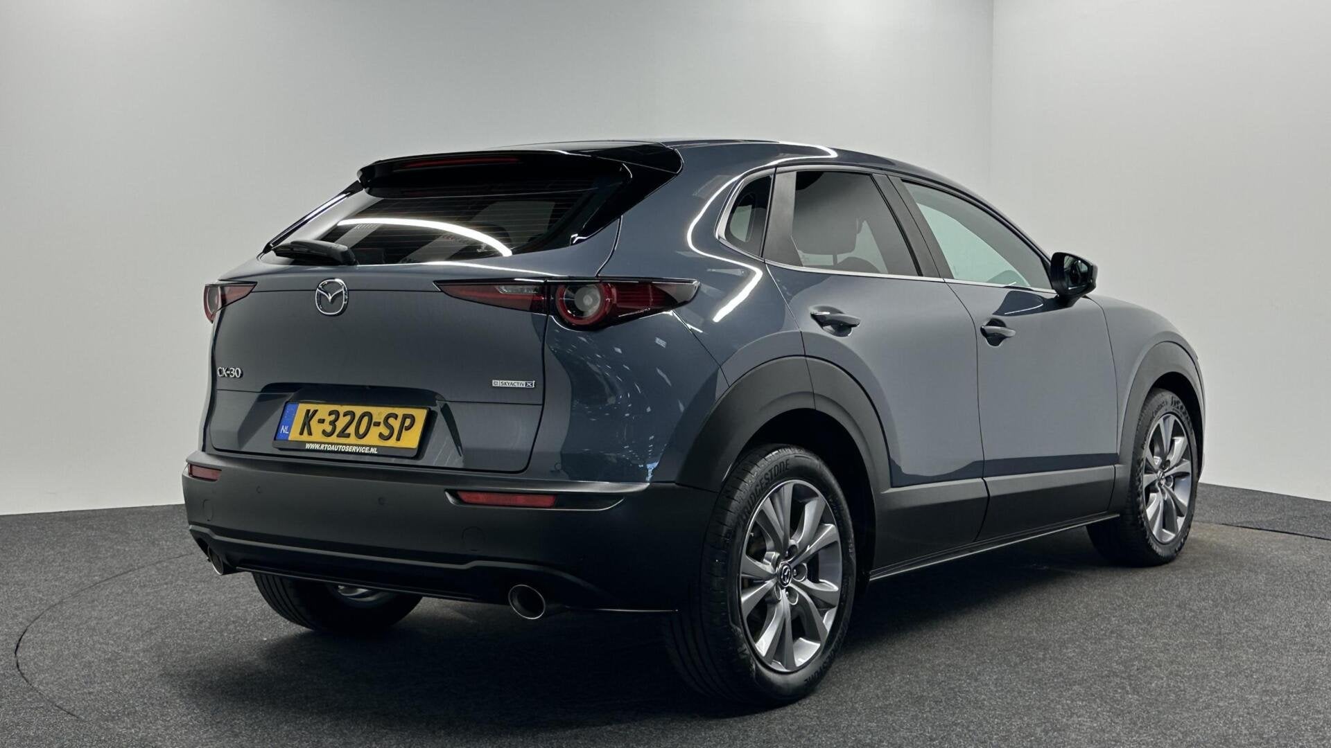 Foto 2 van Mazda CX-30 2.0 e-SkyActiv-X M Hybrid Comfort CAMERA CARPLAY