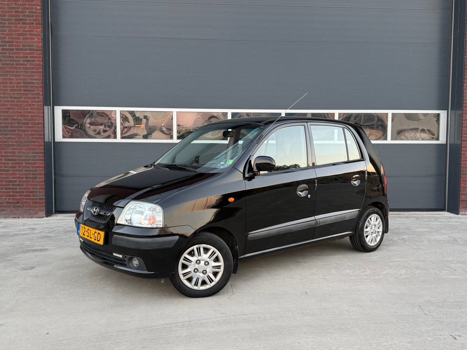 Hyundai Atos 1.1 AUTOMAAT | APK 2027 | AIRCO | TREKHAAK |, Stof, 4 cilinders, Zwart, Origineel Nederlands