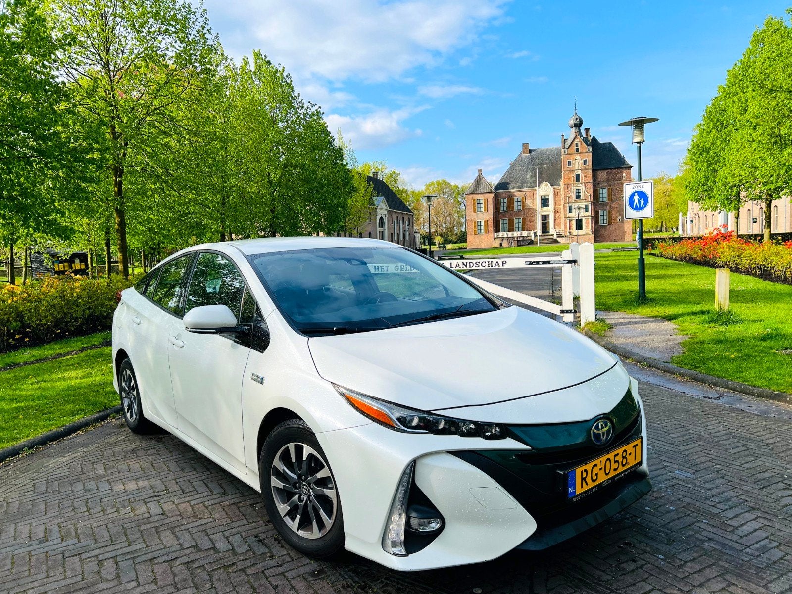 Toyota Prius 1.8 PHV Plug-in Hybrid 122PK Aut 2018 Wit, Dealer onderhouden, ABS, Bedrijf, Hybride Elektrisch/Benzine