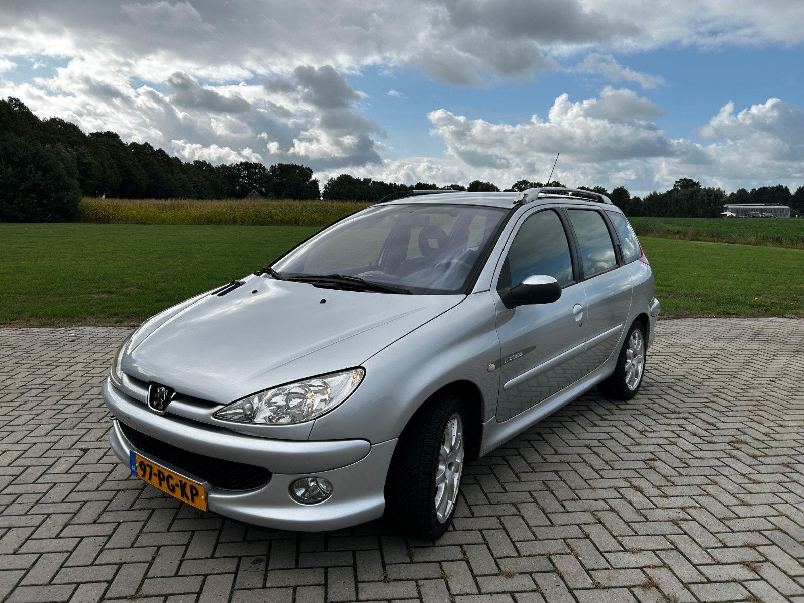 Peugeot 206 1.6 16V SW 2004 Grijs, Auto's, Voorwielaandrijving, 15 km/l, 40 €/maand, 4 cilinders