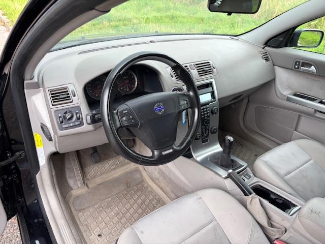 Volvo V50 2.4 Elan ECC Audio/CD Leder/stof LMV 18" Cruisecon, Gebruikt, 700 kg, Leder en Stof, Zwart