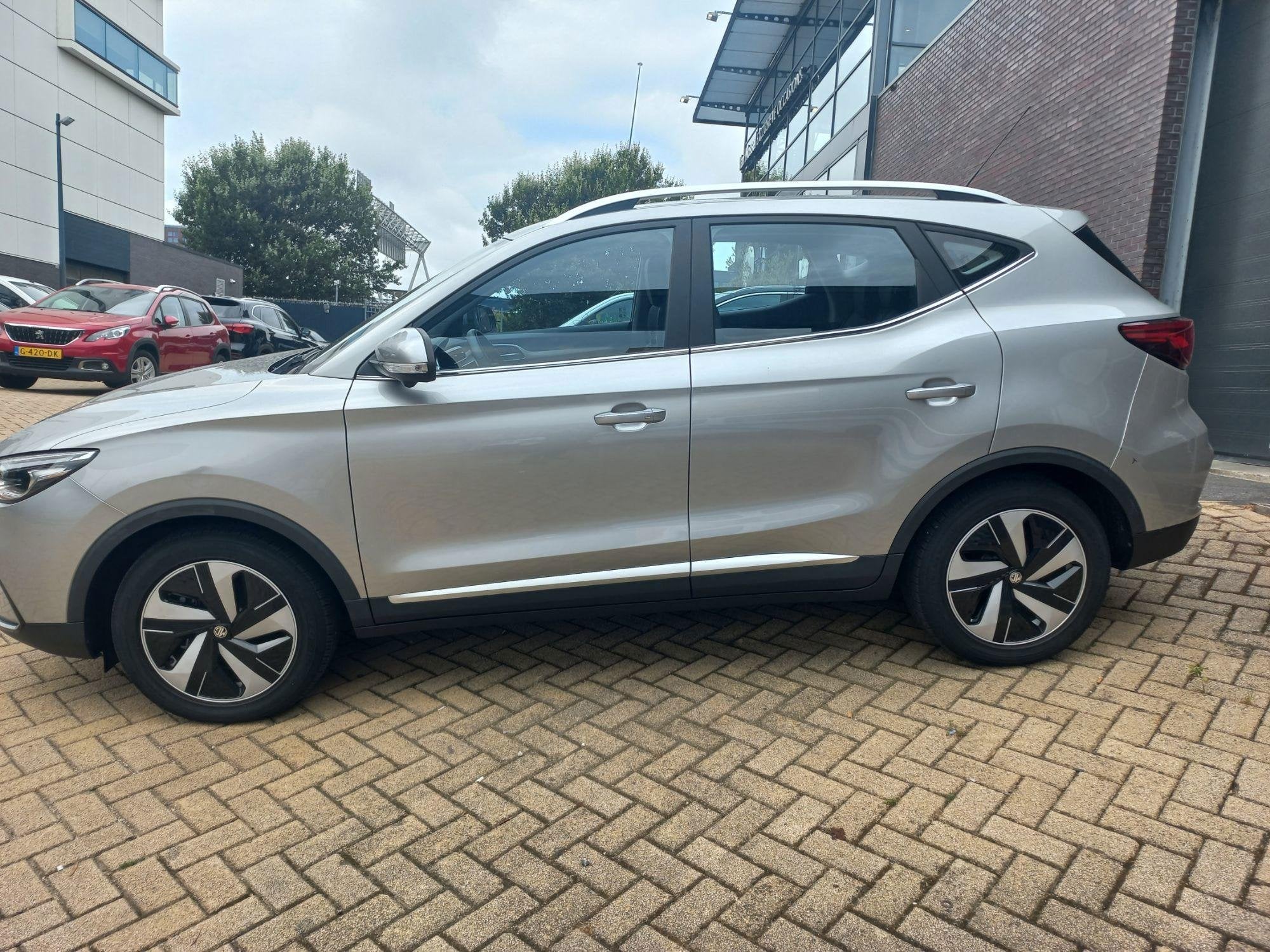 MG ZS EV Long Range Luxury 70 kWh, Auto's, 12 maanden, Gebruikt, ZS, Verwarmde buitenspiegels