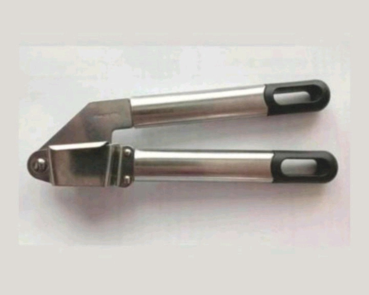 Knoflook pers rvs niet gebruikt, Overige typen, Zilver, Ophalen of Verzenden, Zo goed als nieuw