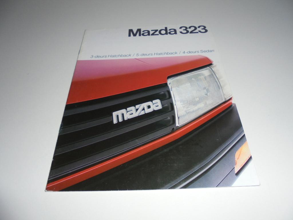 brochure Mazda 323 modellen 1985, Ophalen of Verzenden, Gelezen, Mazda