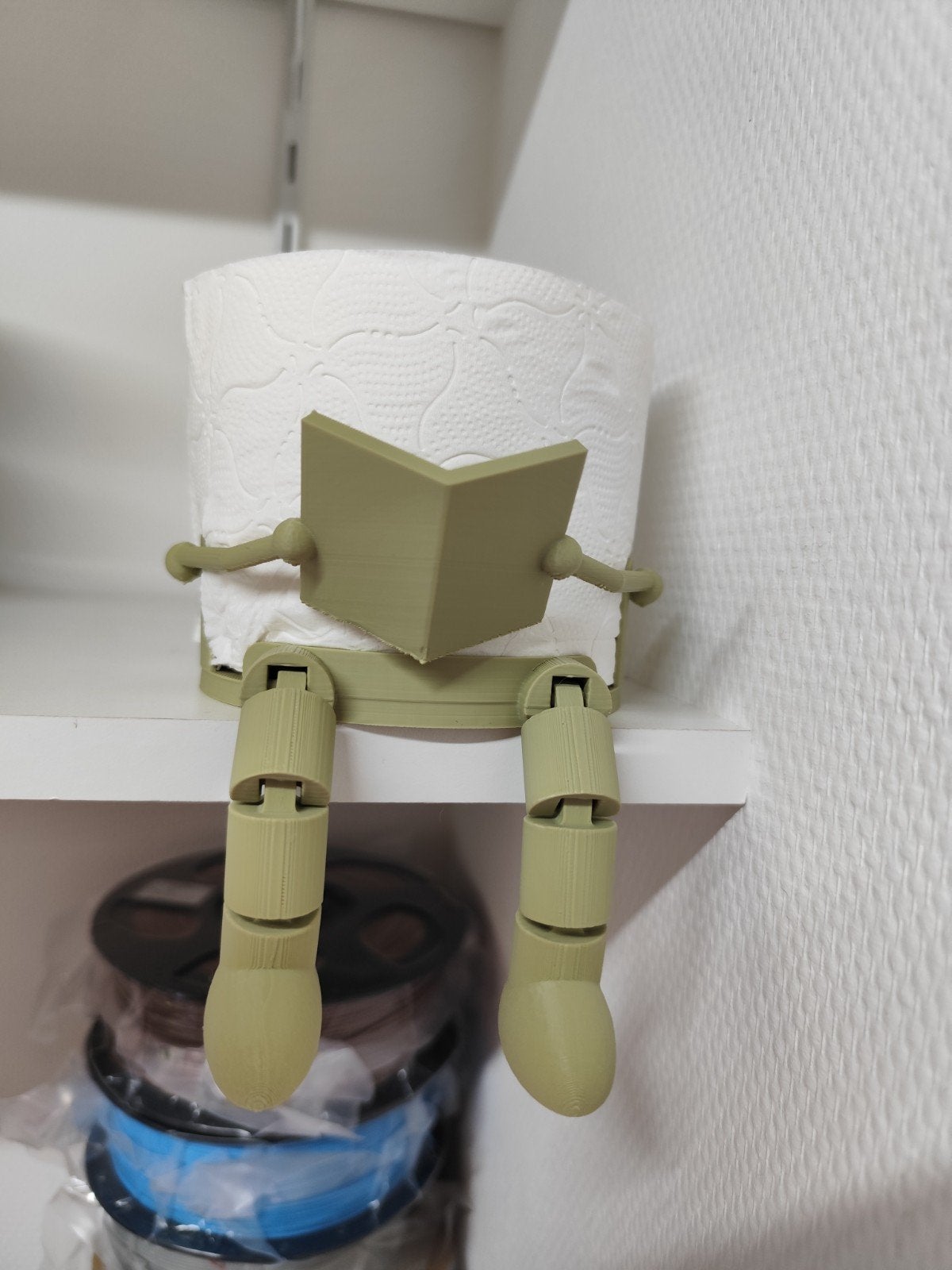 Leuke toiletrolhouder in de vorm van een lezend poppetje, Huis en Inrichting, Ophalen of Verzenden, Nieuw