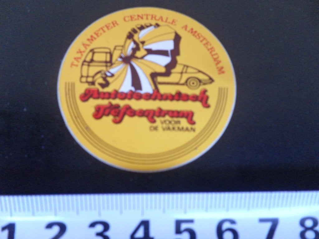sticker Amsterdam TAXAMETER Centrale Autotechnisch Trefcentr, Ophalen of Verzenden, Zo goed als nieuw