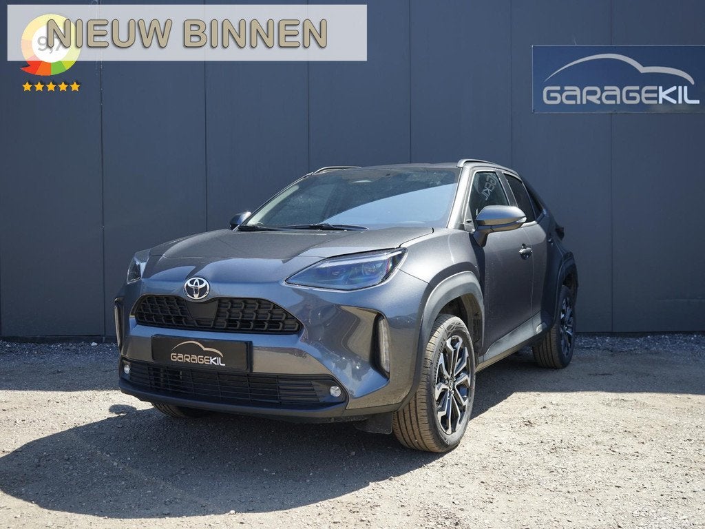 Toyota Yaris Cross 1.5 Hybrid Dynamic Dealeronderh / camera, Stof, Gebruikt, Automatische klimaatregeling, 116 pk