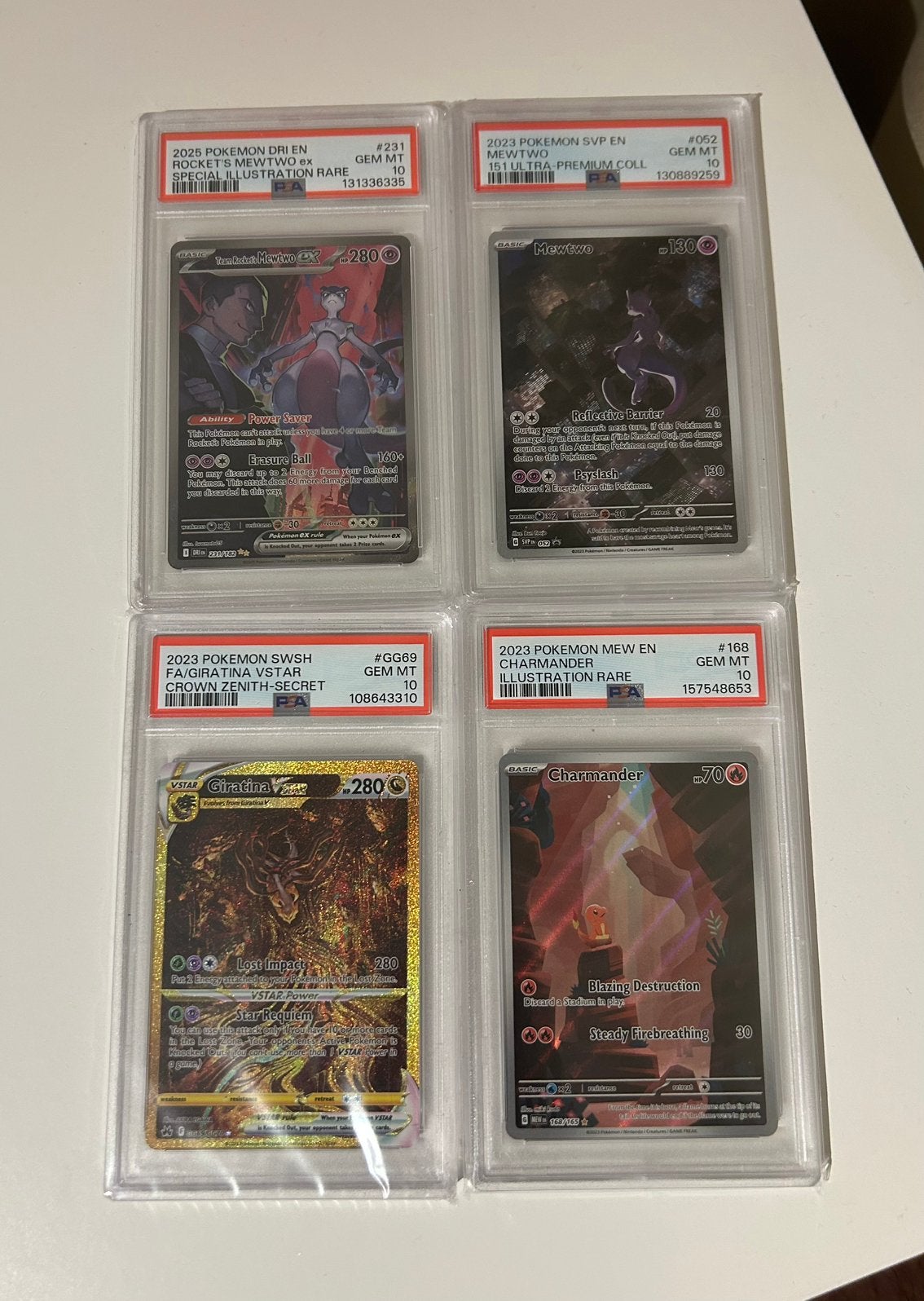 PSA 10 Slabs / Mewtwo - Giratina - Charmander, Ophalen of Verzenden, Zo goed als nieuw, Meerdere kaarten