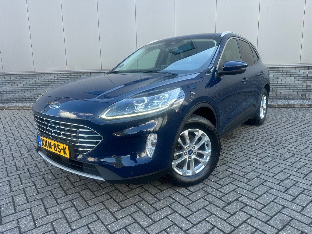 Ford KUGA 2.5 PHEV ST-Line X A Camera+Trekhaak, Auto's, Ford, Gebruikt, Euro 6, 4 cilinders, Blauw