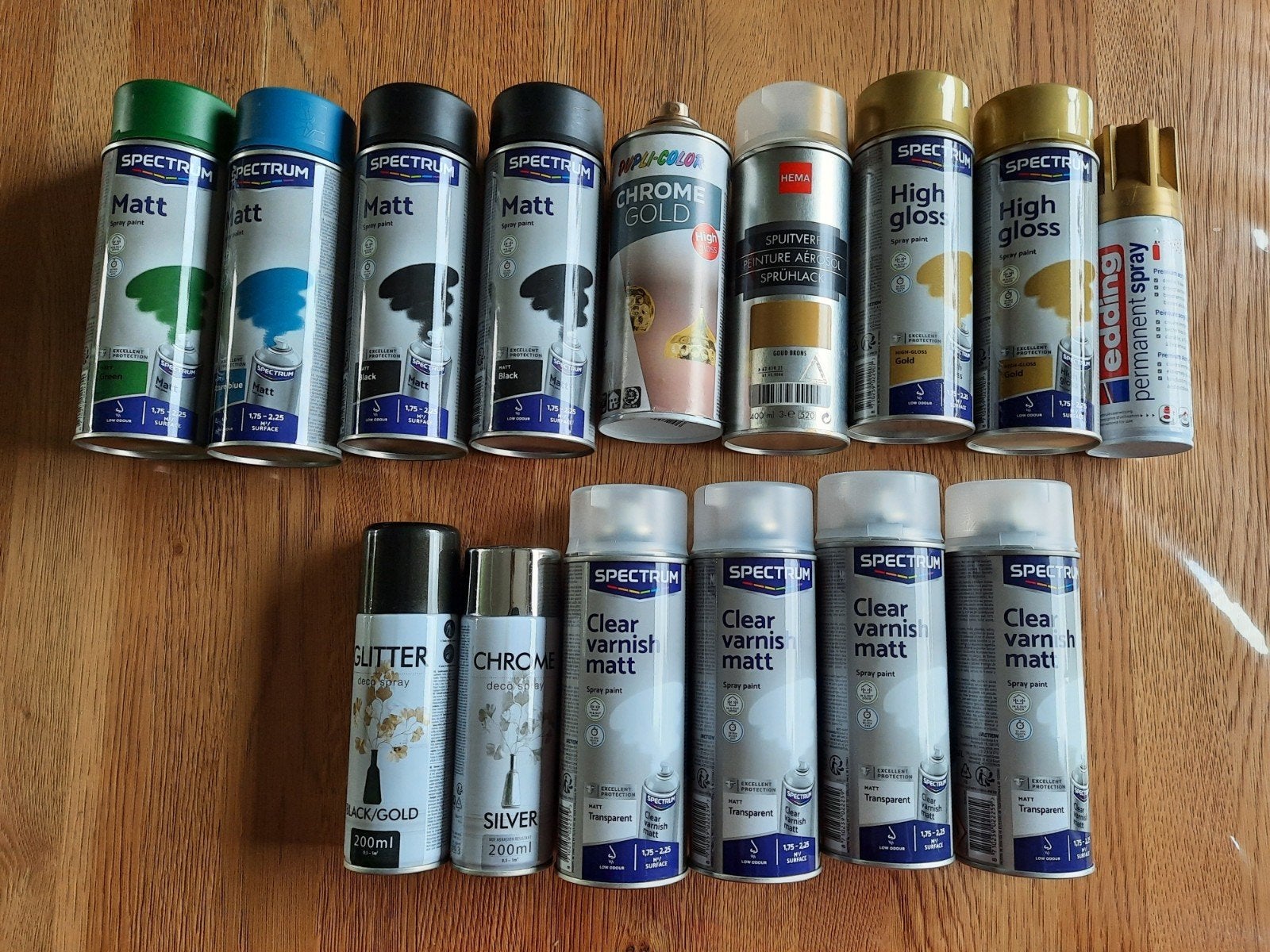 4 spuitbussen transparante acrylaatlak en 2 zwart, Ophalen