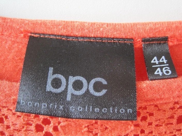 003 - Oranje top met kanten details en ruches - BPC Bonprix, Kleding | Dames, BPC Bonprix Collection, Maat 42/44 (L), Oranje, Ophalen of Verzenden
