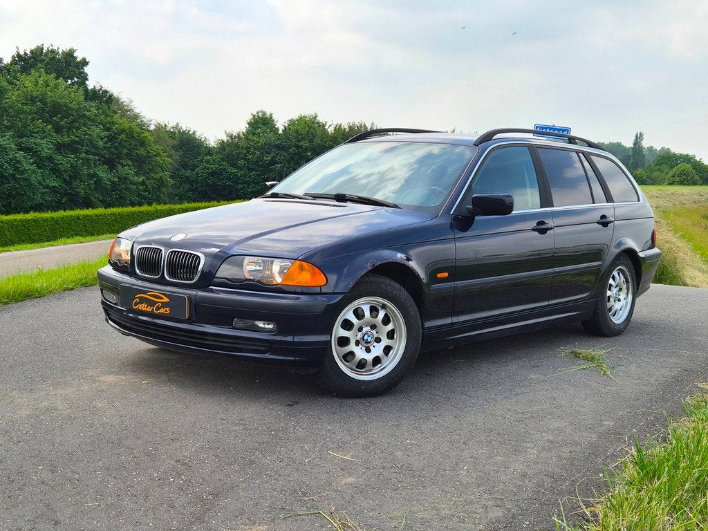 BMW 3-serie Touring 320i Executive | Nieuwe All Seasons, Auto's, BMW, Gebruikt, Zwart, 150 pk, Blauw