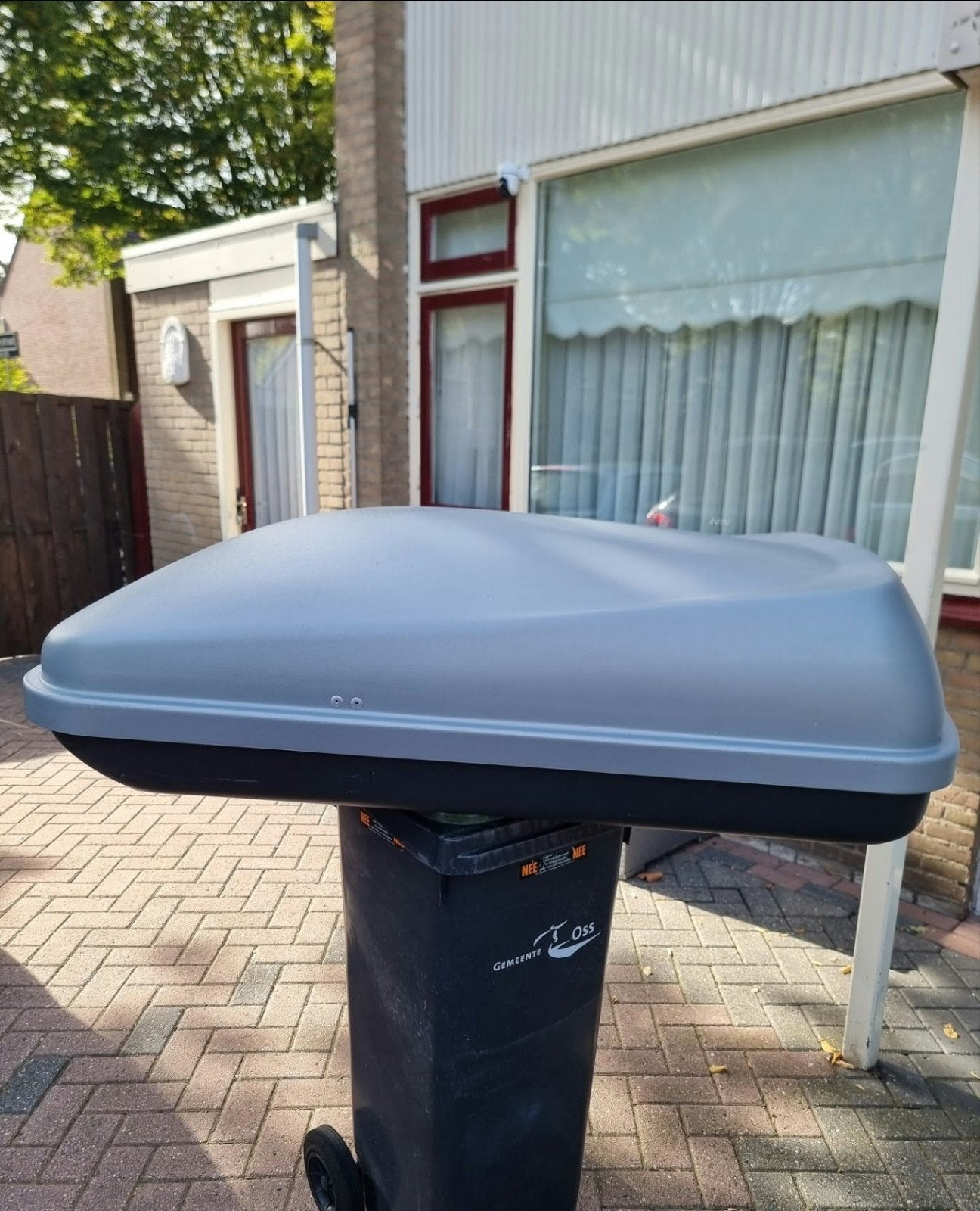 Dakkoffers 380 Liter, Ophalen