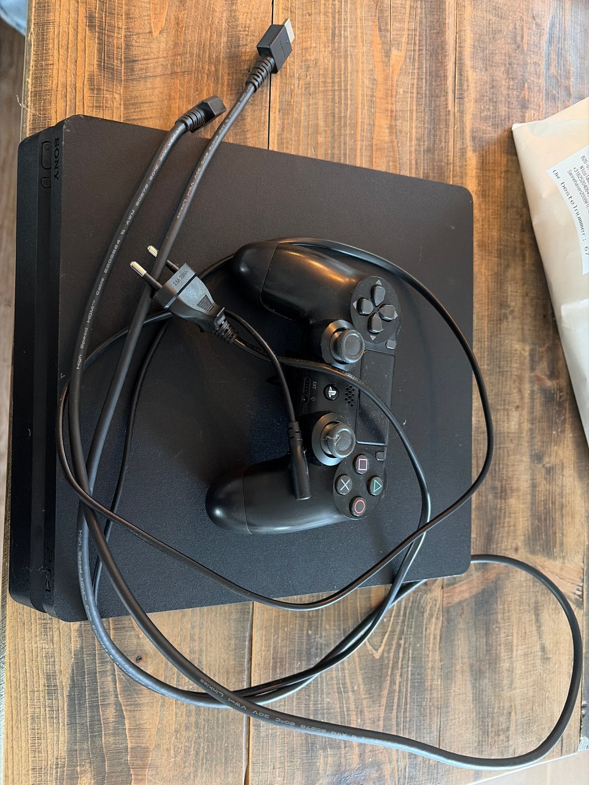 PlayStation 4 Slim met 1 controller en kabels, Spelcomputers en Games, Spelcomputers | Sony PlayStation 4, Verzenden, Met 1 controller