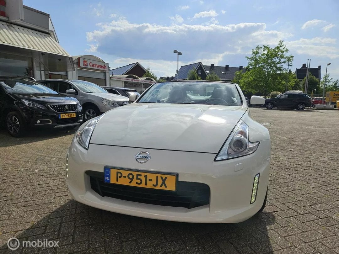Nissan 370 Z Roadster 3.7 V6 328PK 2019 Wit, Auto's, 3696 cc, Achterwielaandrijving, Cabriolet, Wit