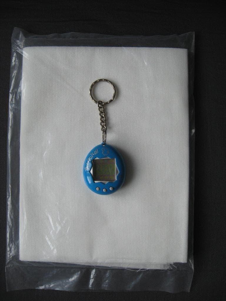 Bandai 1997 - turquoise Tamagotchi (met gebr. aanwijzing), Ophalen of Verzenden