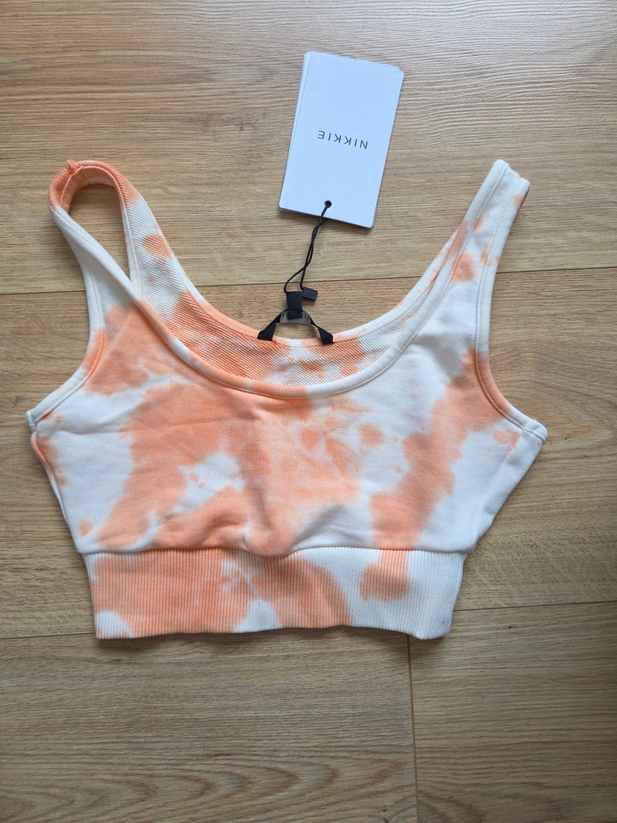 Top Nikkie, maat 32. Nooit gedragen, Meerkleurig, Nieuw, Ophalen of Verzenden, Maat 34 (XS) of kleiner