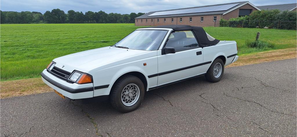 Toyota Celica 1.6 ST CABRIOLET BELASTING VRIJ (bj 1983), Auto's, Zwart, Cabriolet, Open dak, Wit