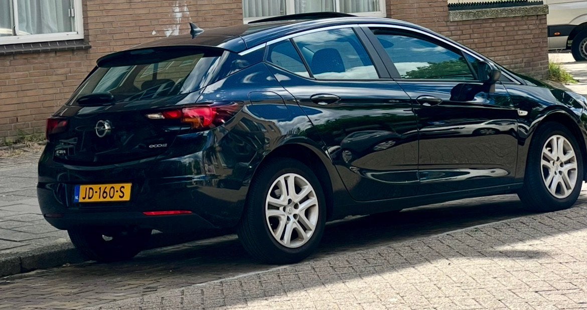 Opel Astra 1.0 Turbo 77KW 5D 2016 Zwart, Stof, Zwart, 610 kg, Origineel Nederlands